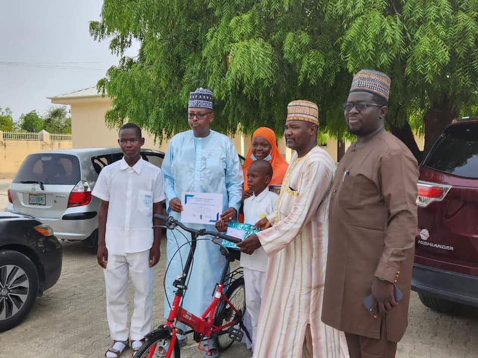 Borno Education Commissioner Awards Scholarship and Bicycle to Brilliant Young Boy